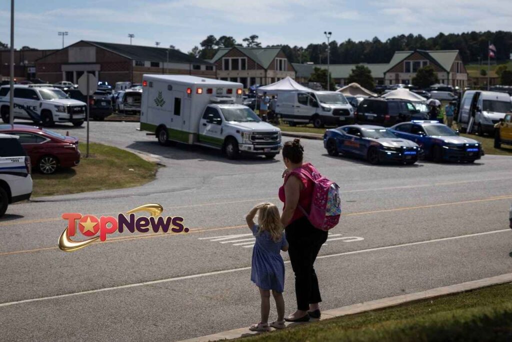 Girl and Mother Observe Response at Apalachee High School