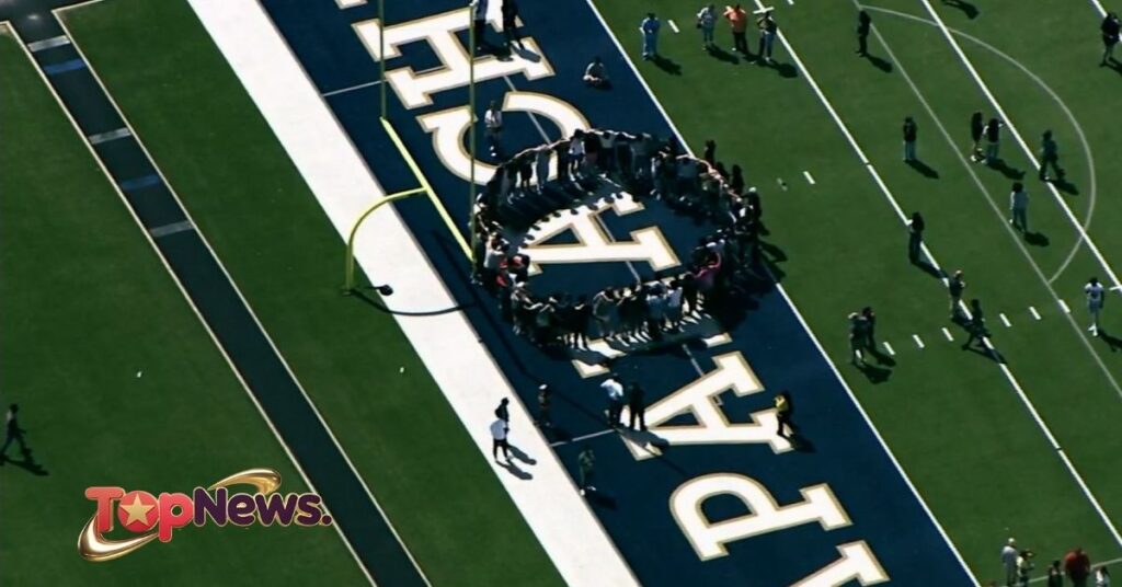 Students gather on the Apalachee High School football field following the shooting on September 4 in Winder.